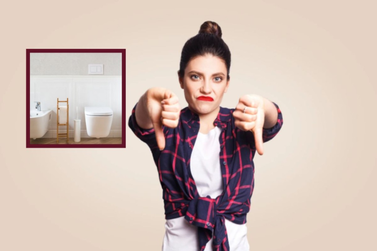 donna con i pollici rivolti in giù e nel riquadro un water e un bidet