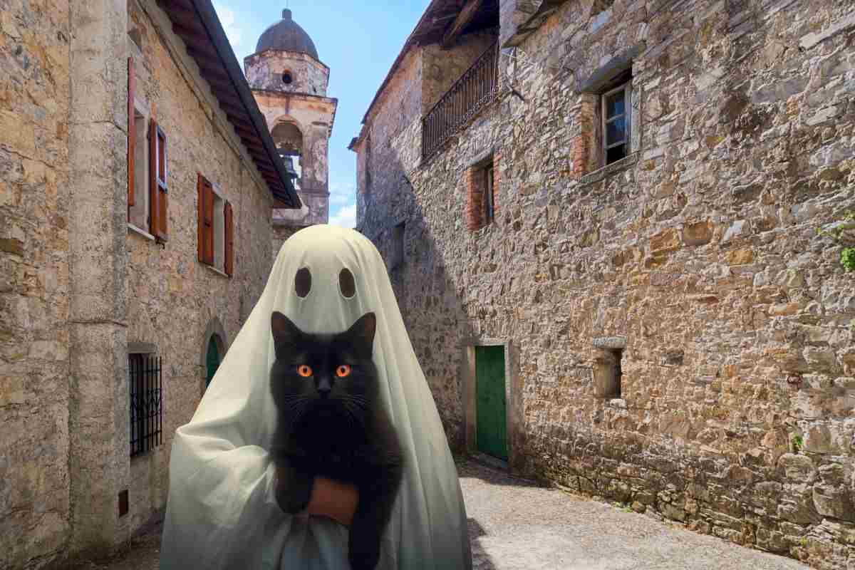 un borgo con un fantasma e un gatto nero