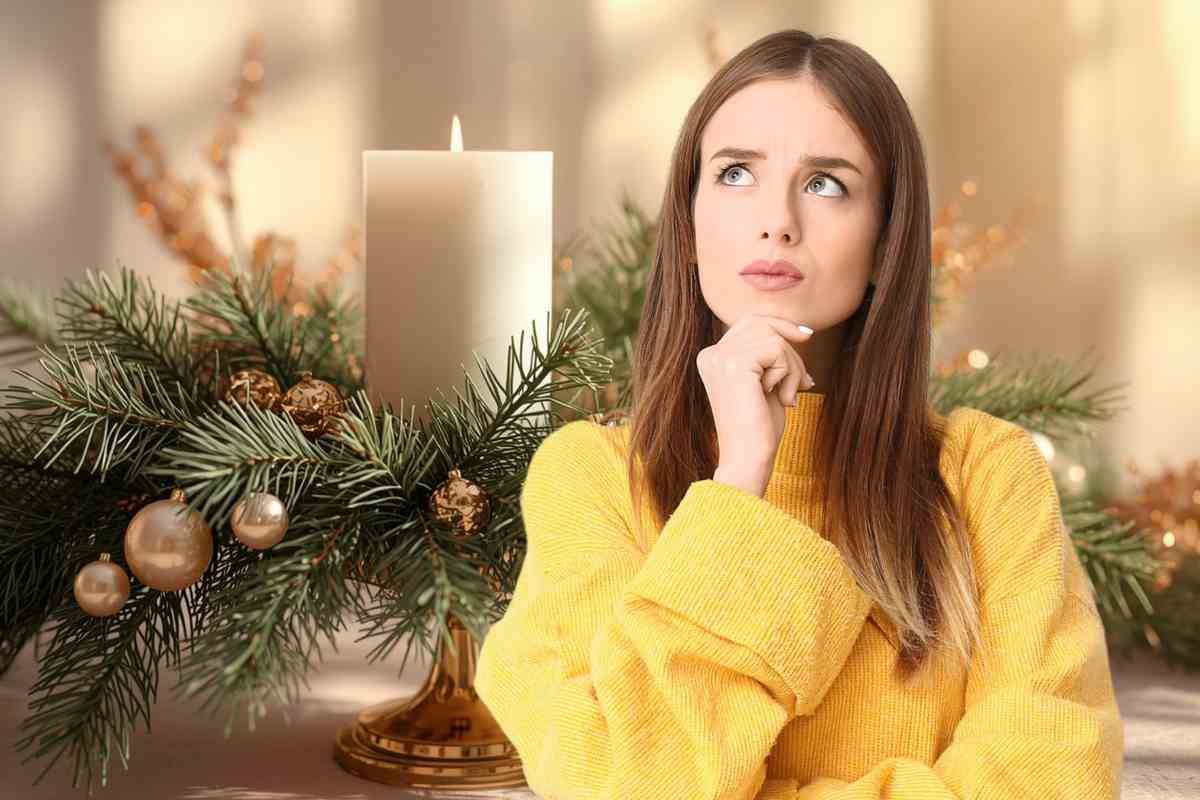 Donna dubbiosa e centrotavola