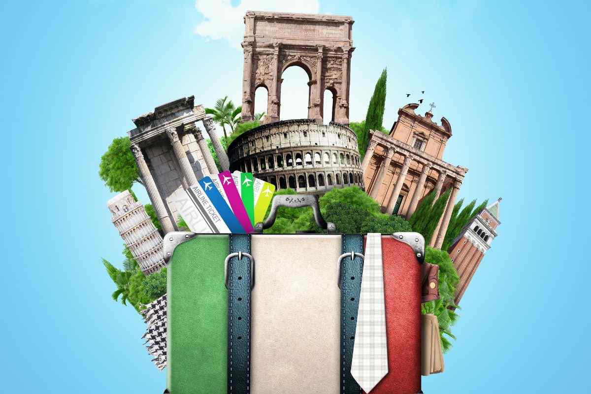 una valigia con sopra alcuni monumenti e una bandiera italiana