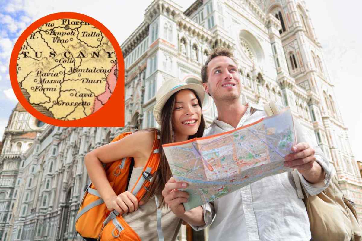 coppia di turisti, cartina toscana in cornice
