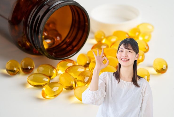 olio di pesce ed una ragazza che fa Ok