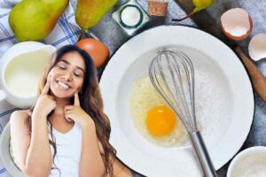 ingredienti per fare una torta ed una ragazza che è felice